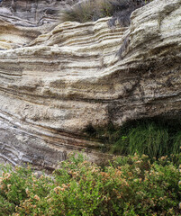 Piled up geological rock formations on the beach of Tenerife.