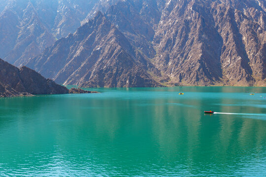landscape view of Hatta dam lake and Hajar mountain in the Dubai, United Arab Emirates