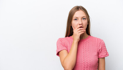 Young Russian woman isolated on white background surprised and shocked while looking right