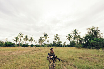 forests and expansive grasslands, soldiers, armed with M16 rifles, their protective helmets and night vision glasses amplifying their ability to detect and neutralize enemy threats.