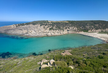 Aerial view of the crystal clear waters of Cala Lungo beach in southern Sardinia