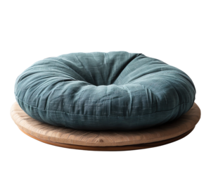 Cozy round teal cushion on a wooden base, ideal for adding a touch of comfort and style to any room. Perfect for modern interiors and lounge areas.