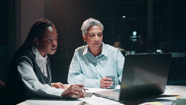 Business people, laptop and audit discussion in office at night for overtime accounting meeting. Corporate team, accountant and auditors with tech for financial report, erp and budget plan deadline