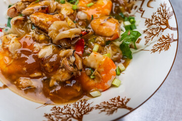 Seafood paste of rice flour (noodle) with egg, shrimp, mantis shrimp, crab and vegetables : delicious Thailand and Vietnam food