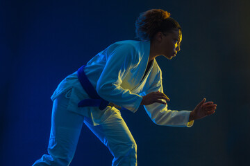 Brazilian girl Jujutsu fighter is ready for the Jiu Jitsu wrestling competition. Brazilian sport ju-jitsu. Mixed martial arts.