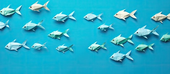 A collage of step-by-step photos demonstrating how to create an origami fish, a simple DIY project ideal for children, with a copy space image.