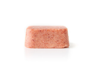 Dog flea and tick medication. Large chew tablet or chewable. Monthly treatment for dogs and puppies for protection and control of parasites. Selective focus. White background.