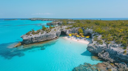 Aerial view of a tropical beach with turquoise waters, sandy shores, and colorful umbrellas.