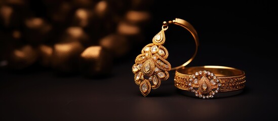 An elegant pair of vintage Golden earrings displayed on a white background with beautiful copy space image. The exquisite Indian kundan bridal jewelry exudes luxury and charm.