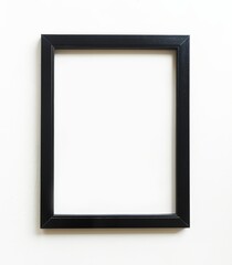 A black picture frame with a white background on the wall in a closeup shot, with a simple and clean composition in a minimalist style