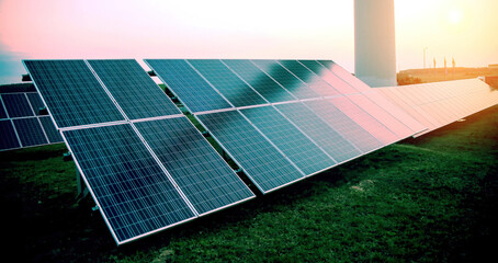 Solar panels at dusk in an open field