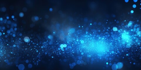 Obraz premium blue and glow particle abstract bokeh background.