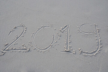 Nature scene of gray sand with hand drawing - HNY 2019 patterns on the sand texture background - Happy New years 
 theme