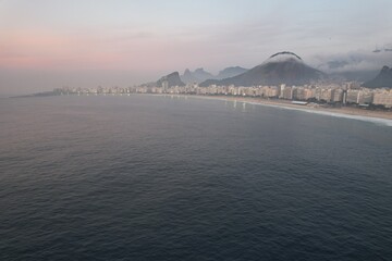 Aerial views from over Copacabana Beach at sunrise