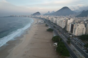 Obraz premium Aerial views from over Copacabana Beach at sunrise