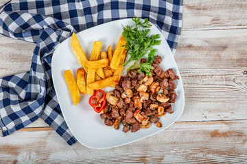 Turkish Cuisine Meat Saute with Mushrooms. Roasted beef with Red Tomatoes (turkish name ,domatesli...