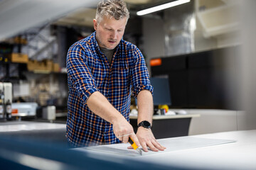 Man working in a printing factory