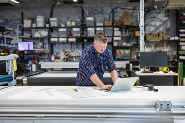 Man working in a printing factory