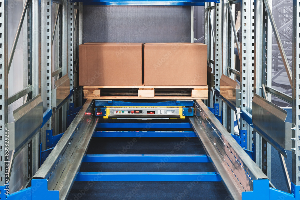 Aufkleber a pallet of boxes is being moved by a conveyor belt