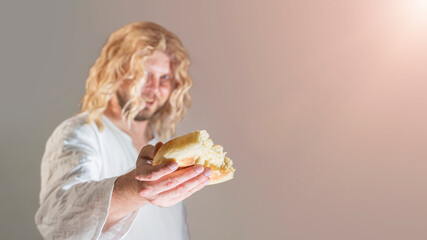 Jesus Christ breaking bread as a symbol of Communion