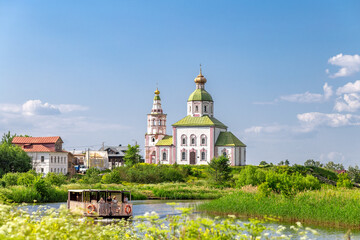 SUZDAL, RUSSIA - A beautiful landscape of Suzdal with a view from the high bank of the Kamenka...