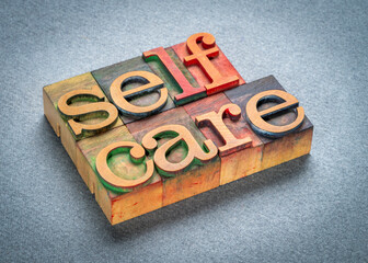 self care word abstract in vintage letterpress wood type art paper - mental, emotional, and...
