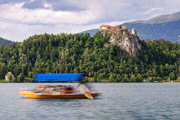 Lake Bled Castle Slovenia and the Motion of a Tourist Boat