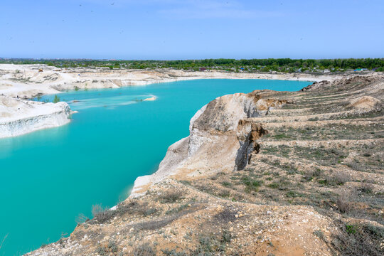 The blue lake, layered mountains, hills of limestone, limestone quarry in the village of West Kazakhstan region.