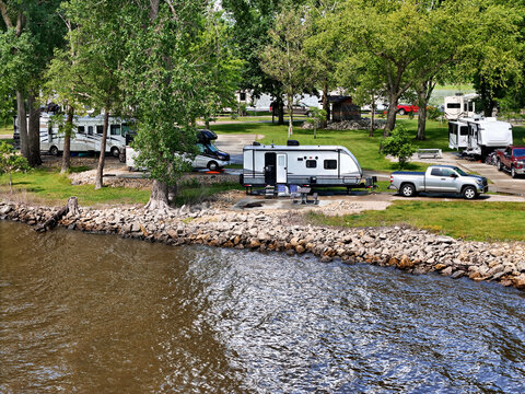 travel trailers camping by the Mississippi river in Illinois