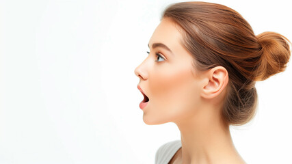 Close up profile of a young Caucasian woman with mouth open wide, shouting. Isolated on white, copy space, aspect ratio 16:9