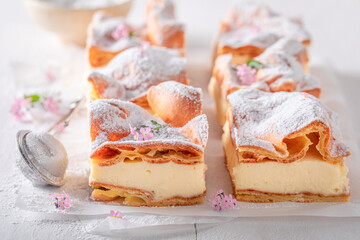 Delicious and tasty Karpatka cake with cream and pastry dough.