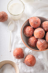 Sweet and delicious mini doughnuts baked at home.