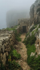 Fototapeta premium In a mystical atmosphere Mnajdra surrounded by mis_009