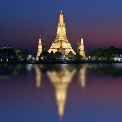 Fototapeta premium Wat Arun Temple at sunset in bangkok Thailand. Wat Arun is a Buddhist temple in Bangkok Yai district of Bangkok, Thailand