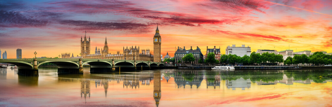 Big Ben and Westminster bridge at sunrise in London. England