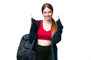 Young sport woman with sport bag over isolated chroma key background pointing up a great idea