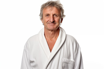Middle aged man over isolated white background in a bathrobe