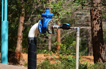 Metal water pipes and taps