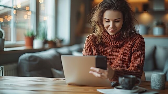 In the background, a woman works on multiple devices at her desk. A woman with a laptop at a caf&eacute; checks her e-mail. And an administrative manager reading an important meeting text on her cell phone.