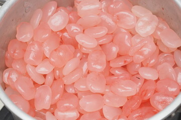 close up of palm fruit with red syrup