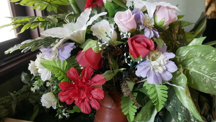 synthetic flowers that resemble real flowers for room decoration. Photo of a beautiful blooming flower plant taken in close-up and selected focus