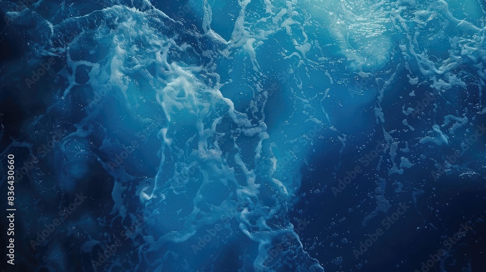 Poster a close-up shot of a wave breaking on the surface of the ocean