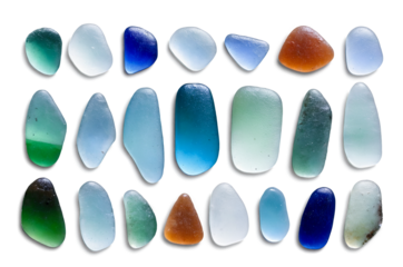 An assortment of colorful sea glass pieces presented on a transparent, png, white background, varied shapes and colors