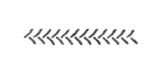 black traces of tractor tires on white background.