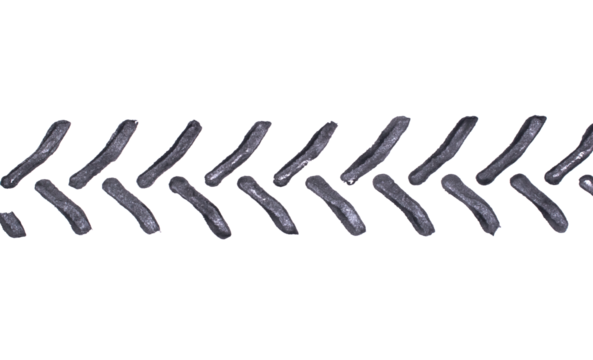 black traces of tractor tires on white background