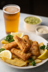 fish and chips with ale beer, tartar and mushy peas
