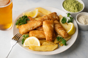 fish and chips with ale beer, tartar and mushy peas