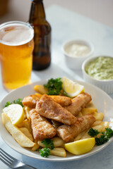 fish and chips with ale beer, tartar and mushy peas