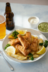 fish and chips with ale beer, tartar and mushy peas