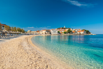 Idyllic beach near the charming Primosten town, Adriatic Sea in Croatia
